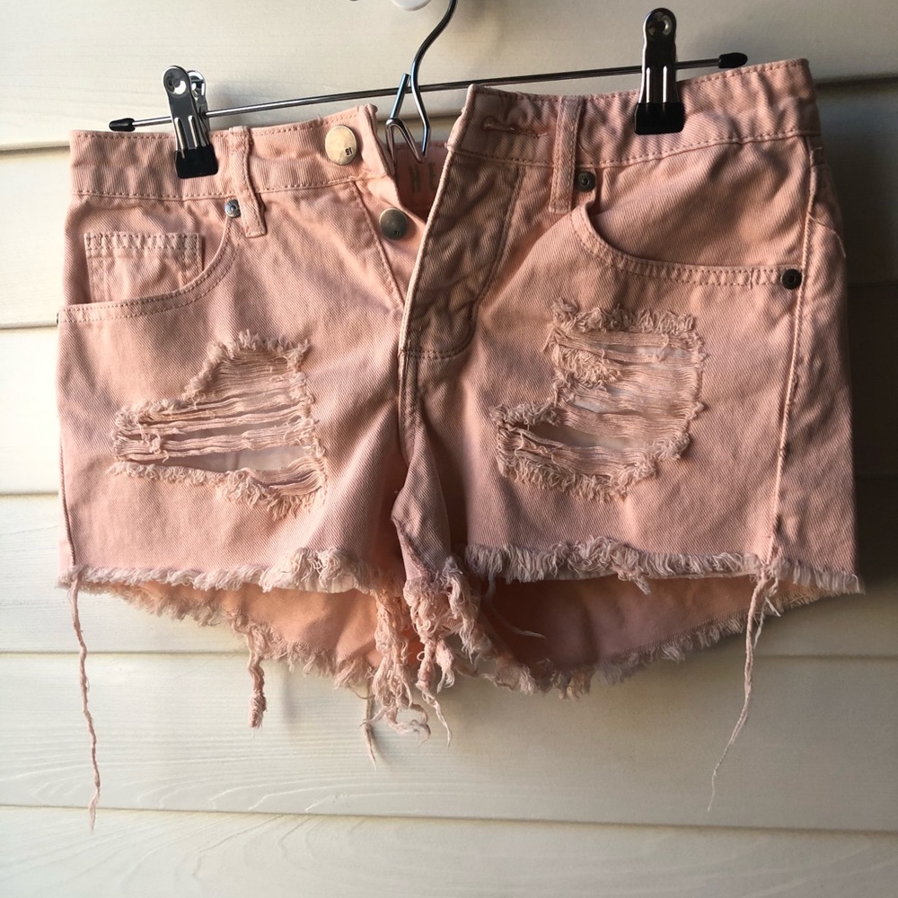 Cute pink distressed shorts